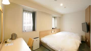 Twin Room, Non Smoking | Desk, blackout curtains, iron/ironing board, free WiFi