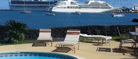 Outdoor pool, open 9:00 AM to 7:00 PM, sun loungers