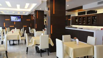 Breakfast, lunch, dinner served; international cuisine