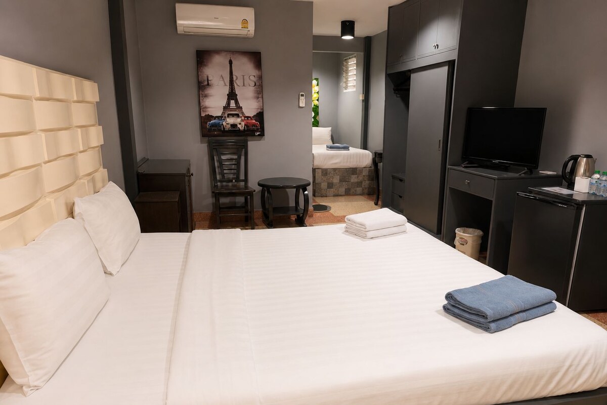Economy Triple Room, Multiple Beds | In-room safe, blackout drapes, WiFi (free), individually furnished