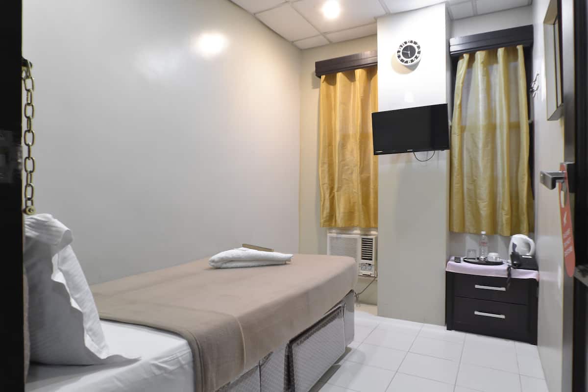 Standard Single Room, 1 Twin Bed, Shared Bathroom | WiFi (free), individually furnished, bed sheets
