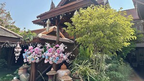A traditional building with ornate architectural details, including a tiled roof and decorative elements. - Montri Resort Donmuang Bangkok (Bangkok)