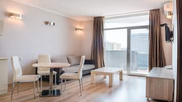 Apartment, 1 Bedroom | Living area | Flat-screen TV, pay movies