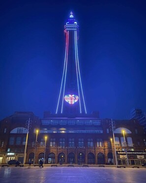 The Blackpool Tower with illuminated heart-shaped lights at the top. - Danescourt Lodge (Blackpool)
