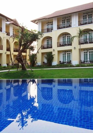 Outdoor pool, open 7:00 AM to 10:00 PM, pool umbrellas, pool loungers