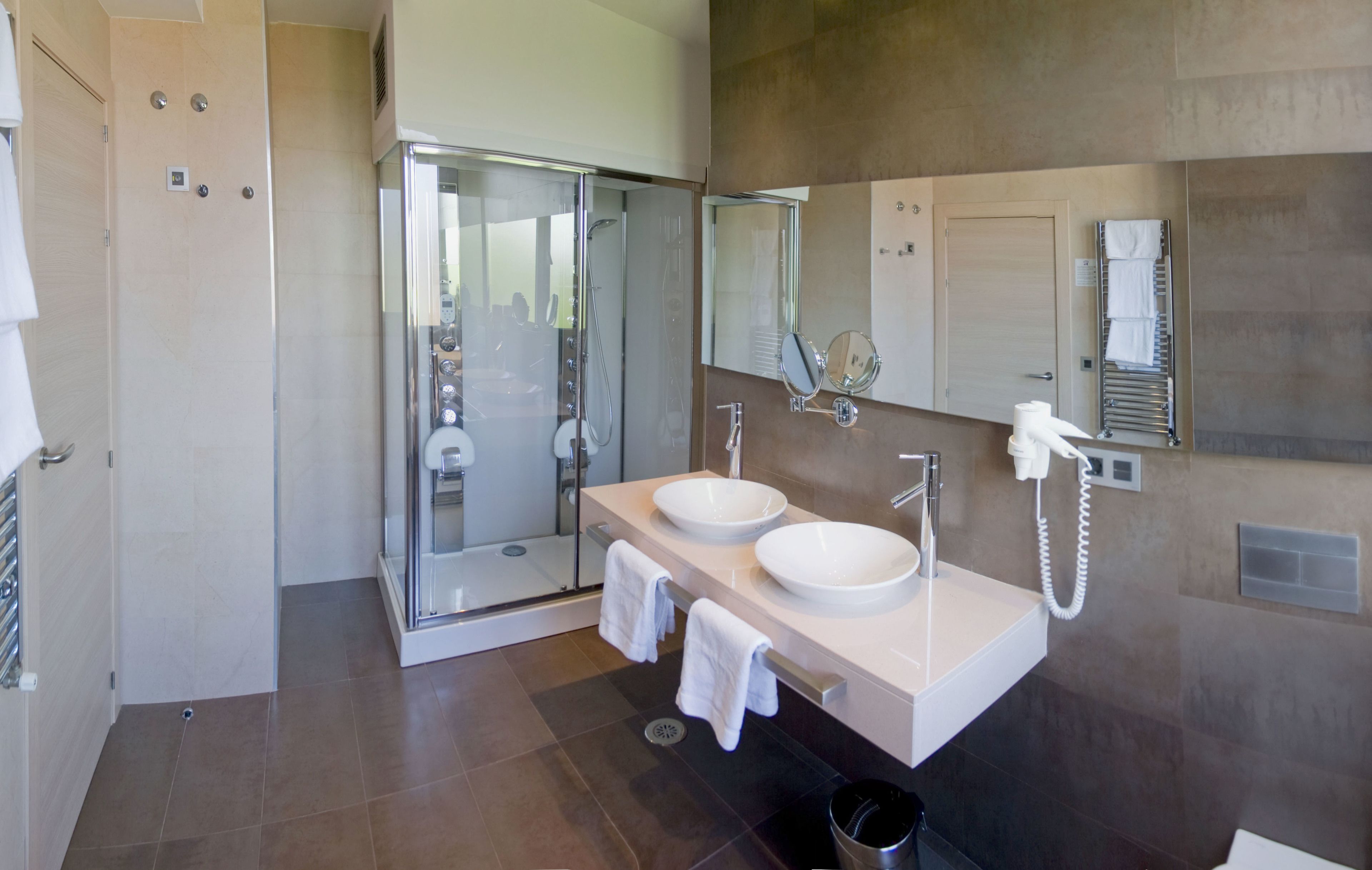 double room, jetted tub (or hydromassage shower) | bathroom | free toiletries, hair dryer, towels