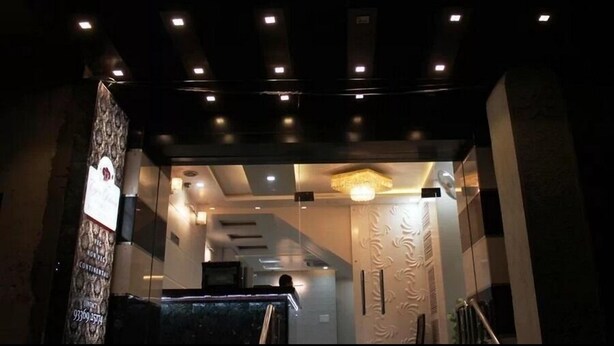 A hotel entrance with a sign reading "CENTRAL" and a staircase leading inside. - Hotel Central Residency (Varanasi)