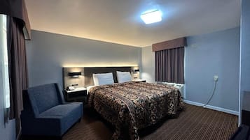 Economy Room, 1 King Bed, Non Smoking | Rollaway beds, free WiFi, bed sheets