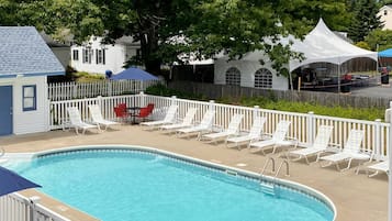 A heated pool, open 9 AM to 8:00 PM, pool umbrellas, sun loungers