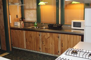 Comfort Suite, 2 Queen Beds | Private kitchen | Fridge, microwave, paper towels