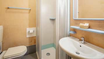 Shower, bidet, towels, soap