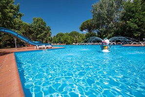 Seasonal outdoor pool, open 9:00 AM to 7:00 PM, sun loungers