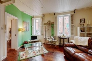 Economy Apartment, 2 Bedrooms, Kitchen, City View | Living area | Flat-screen TV