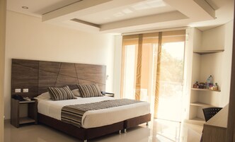 Junior Suite, 1 Queen Bed, Hot Tub | Premium bedding, minibar, in-room safe, desk