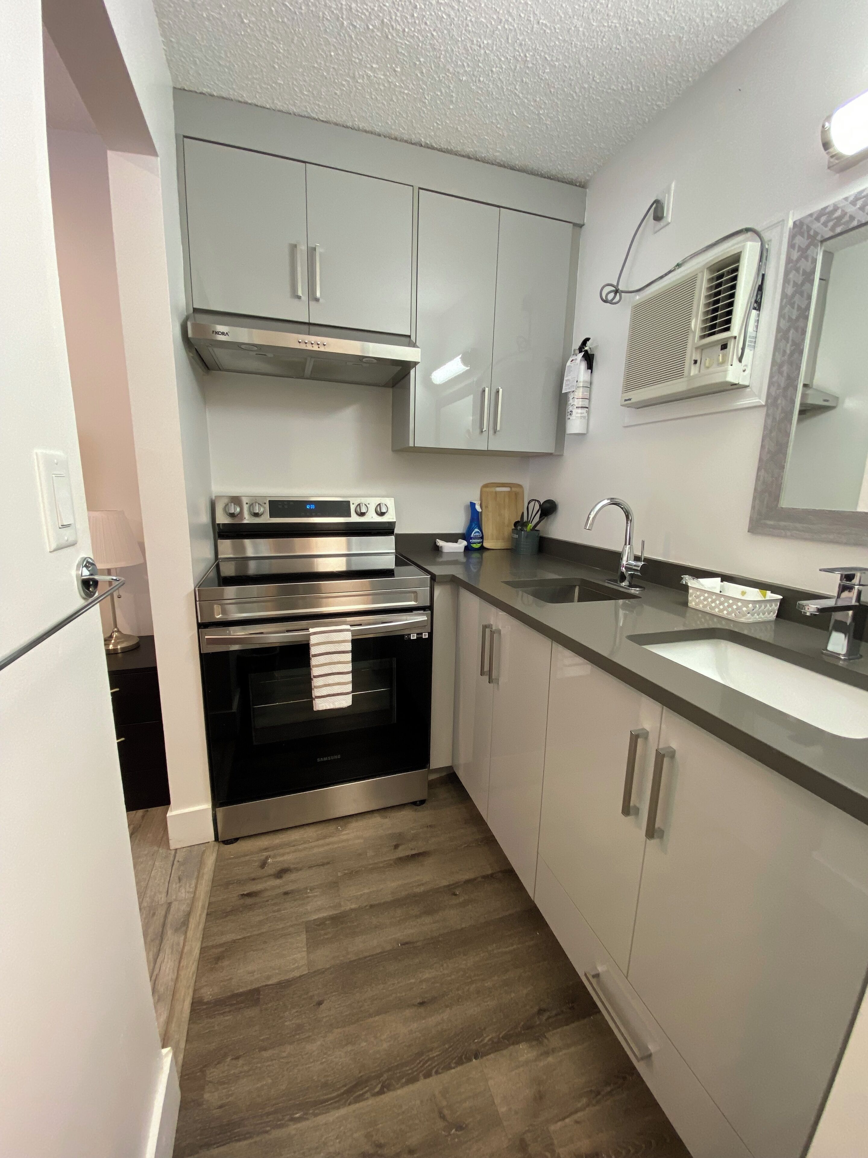 Premium Room, 2 Queen Beds, Refrigerator & Microwave | Private kitchen | Full-size fridge, microwave, oven, coffee/tea maker