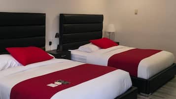 Kamar Premium, 2 Tempat Tidur Queen, lemari es & microwave | Seprai premium, Wi-Fi gratis, dan seprai linen