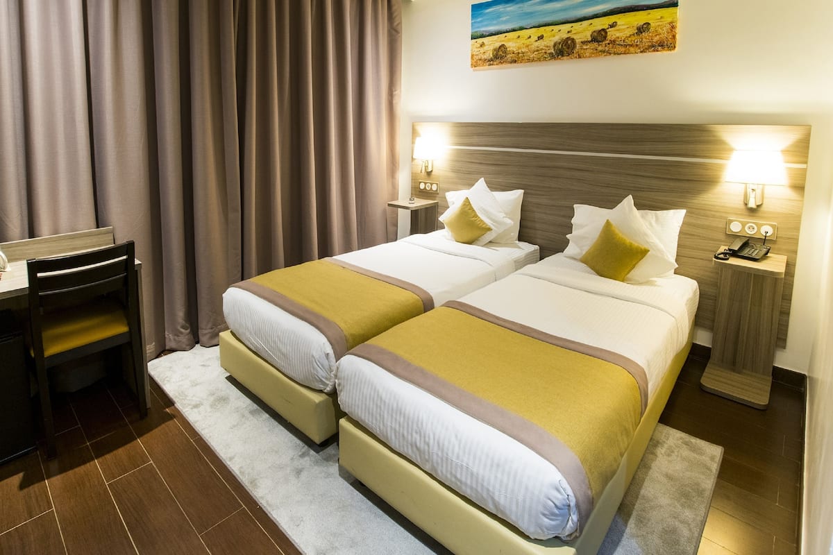 Twin Room | Premium bedding, in-room safe, desk, blackout drapes