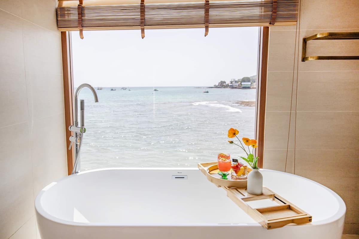 sweet room | bathroom | hair dryer, towels, soap, shampoo