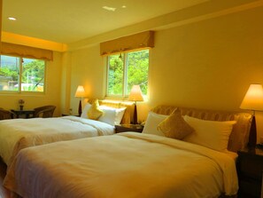 Standard-Vierbettzimmer | Hochwertige Bettwaren, Daunenbettdecken, Pillowtop-Betten