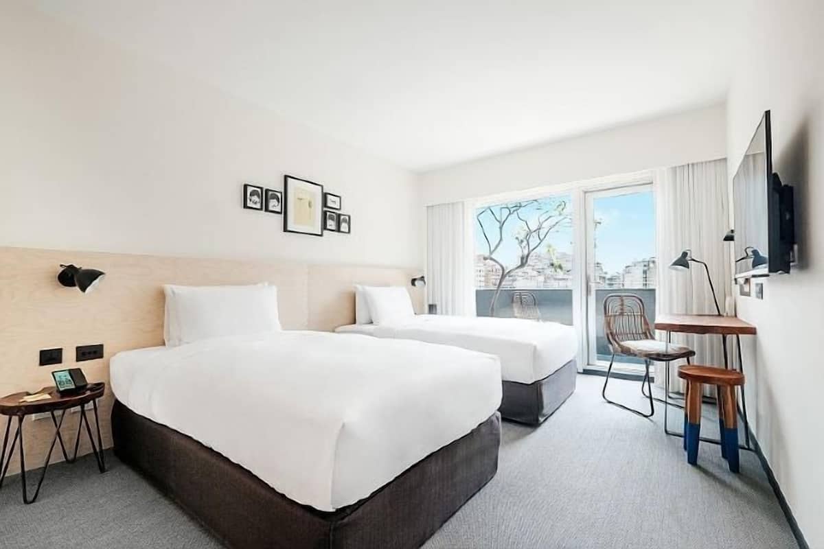 Luxe beddengoed, donsdekens, een kluis op de kamer, een bureau