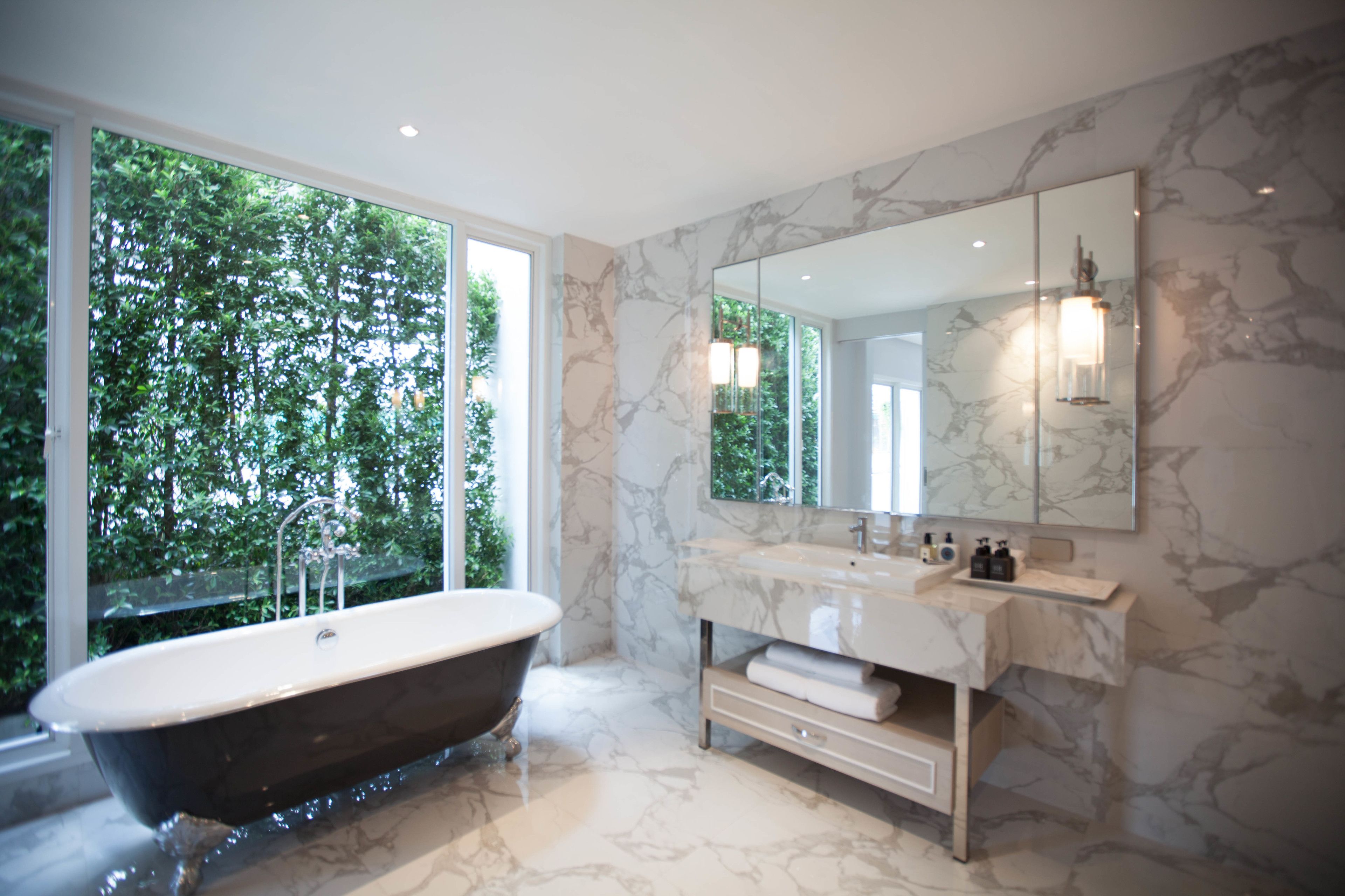 marble suite | bathroom | free toiletries, hair dryer, slippers, bidet