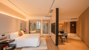 Premium bedding, down comforters, in-room safe, desk