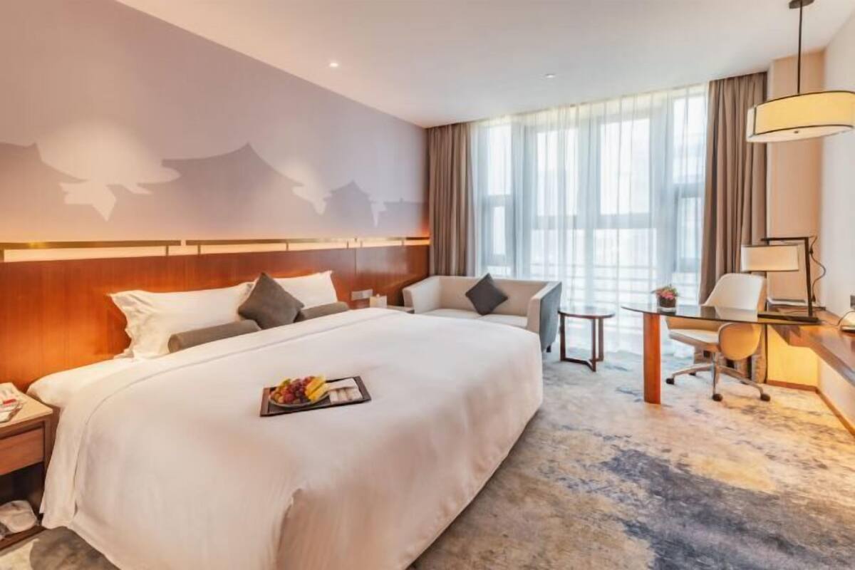 Premium bedding, down duvets, in-room safe, desk