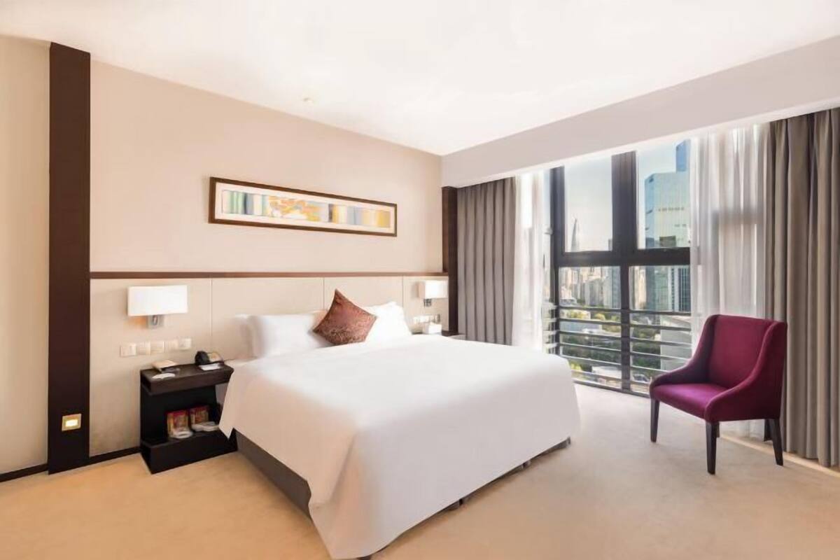 Premium bedding, down duvets, in-room safe, desk