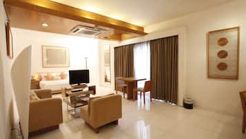 Suite | Living area | Flat-screen TV, fireplace, DVD player, pay movies