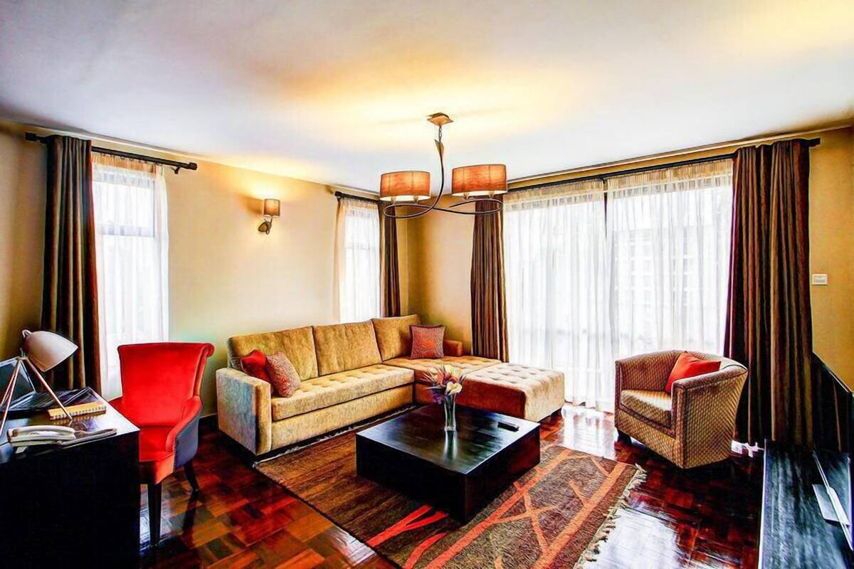 Standard-Apartment, 1 Schlafzimmer, Stadtblick | Wohnbereich | Flachbildfernseher