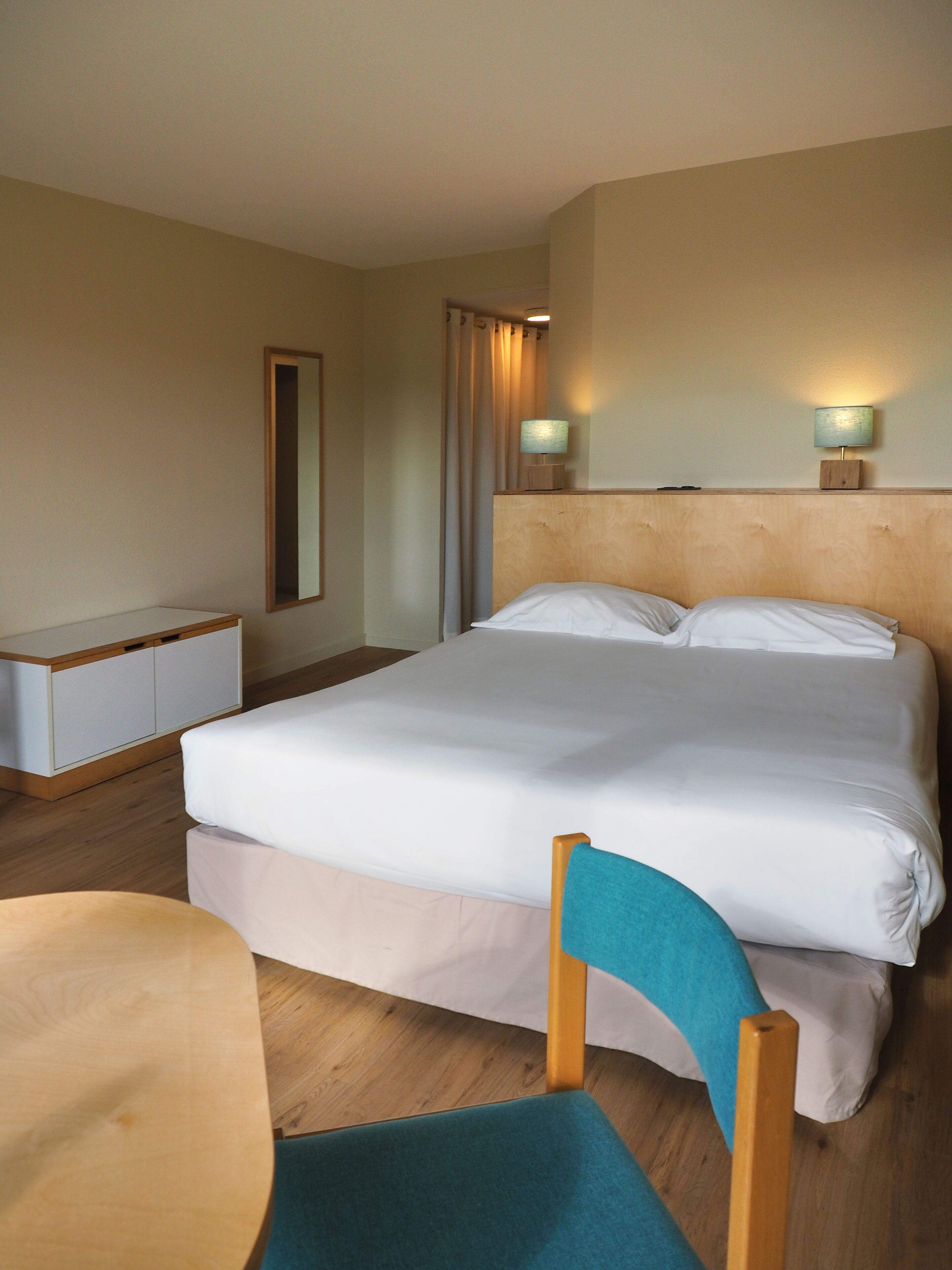 premium bedding, select comfort beds, desk, blackout curtains