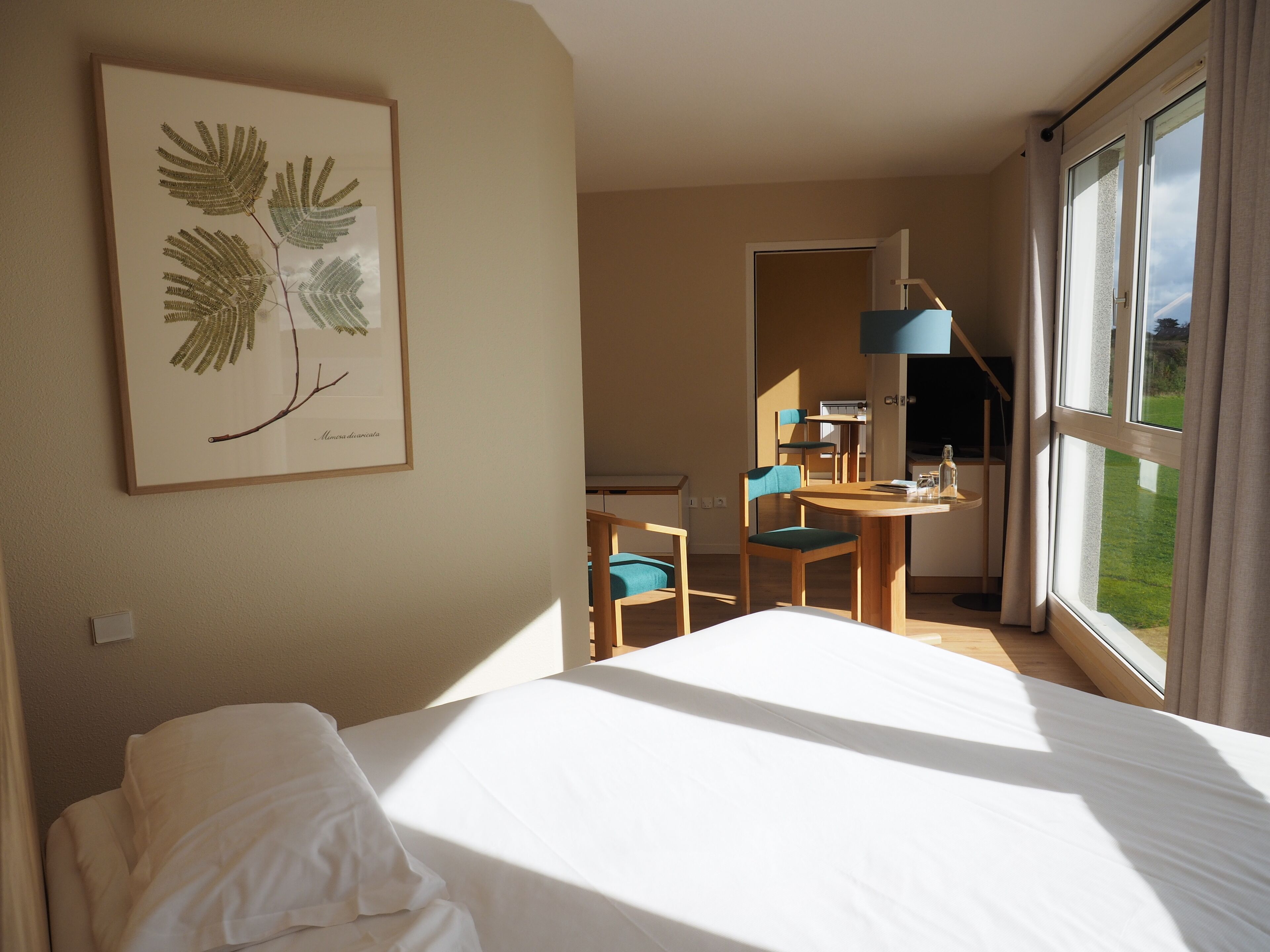 classic double room, partial ocean view | premium bedding, select comfort beds, desk, blackout curtains