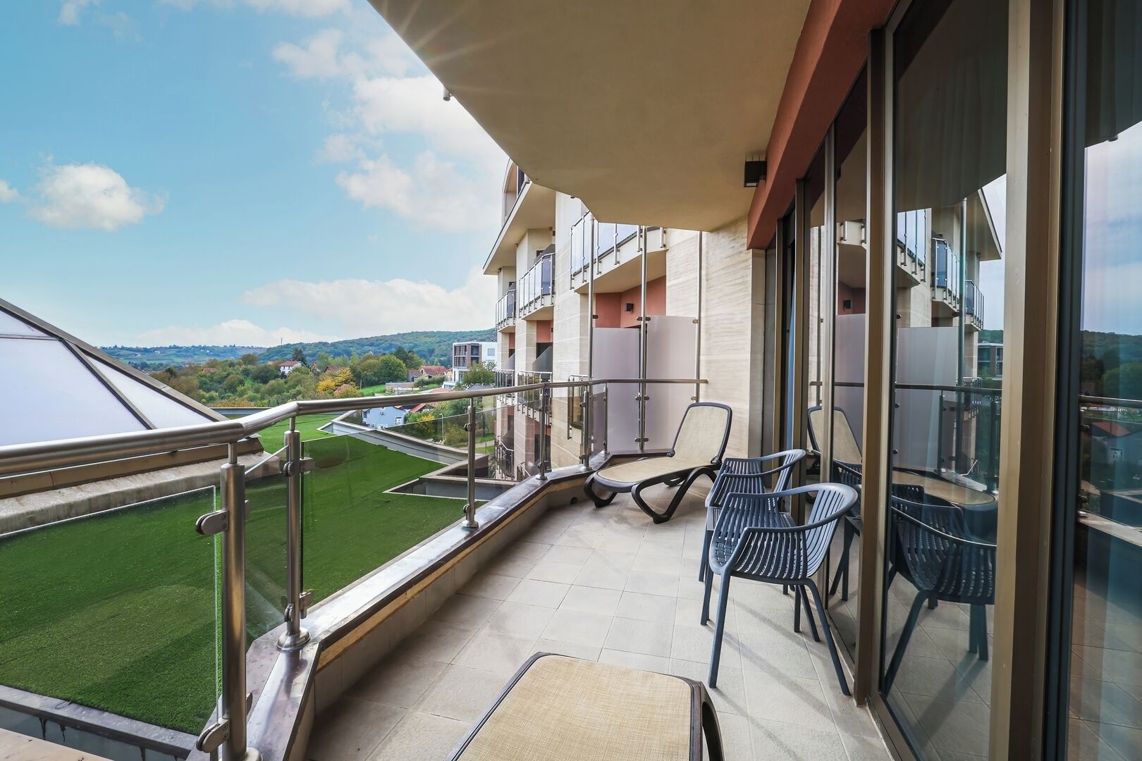 luxury suite, sauna, city view | terrace/patio