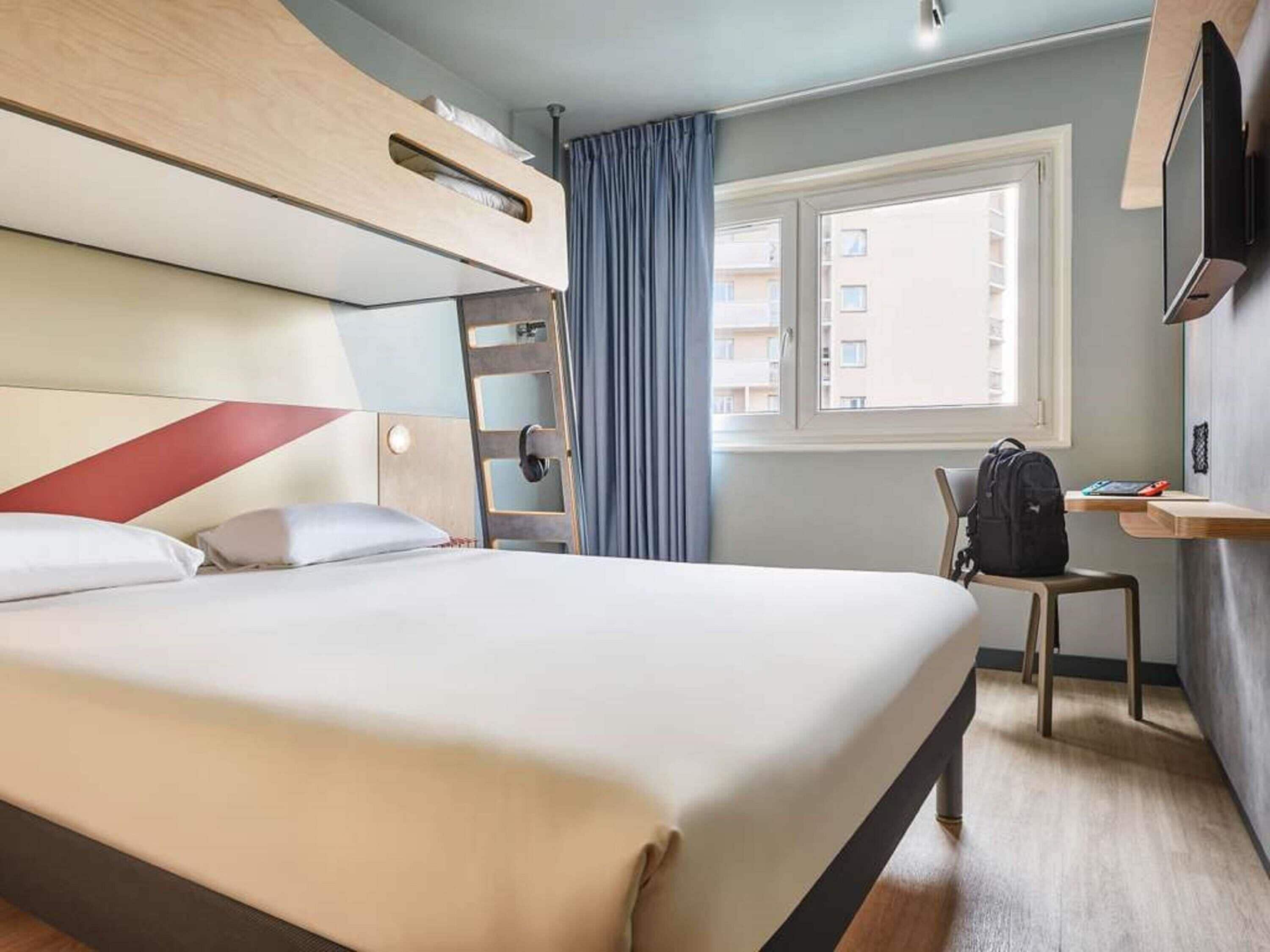 Premium bedding, desk, blackout drapes, soundproofing