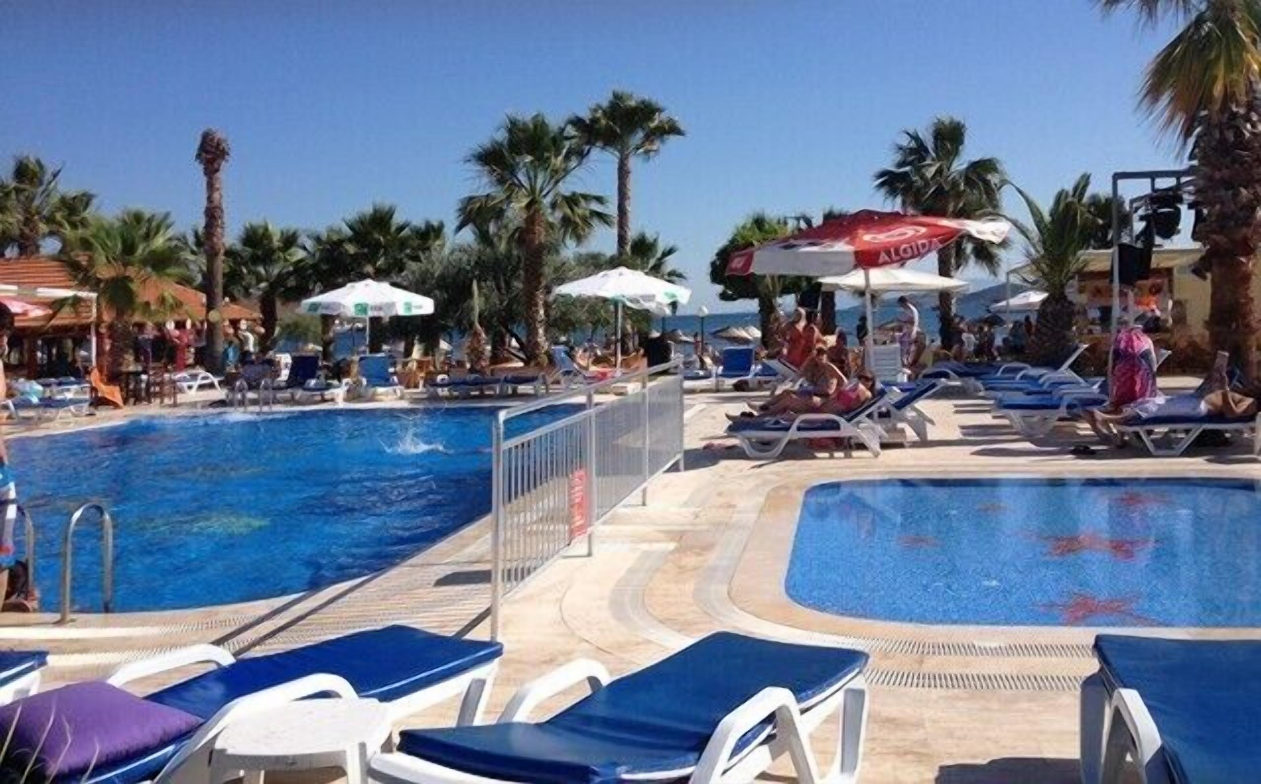 2 outdoor pools, open 9:00 am to 6:00 pm, pool umbrellas, pool loungers