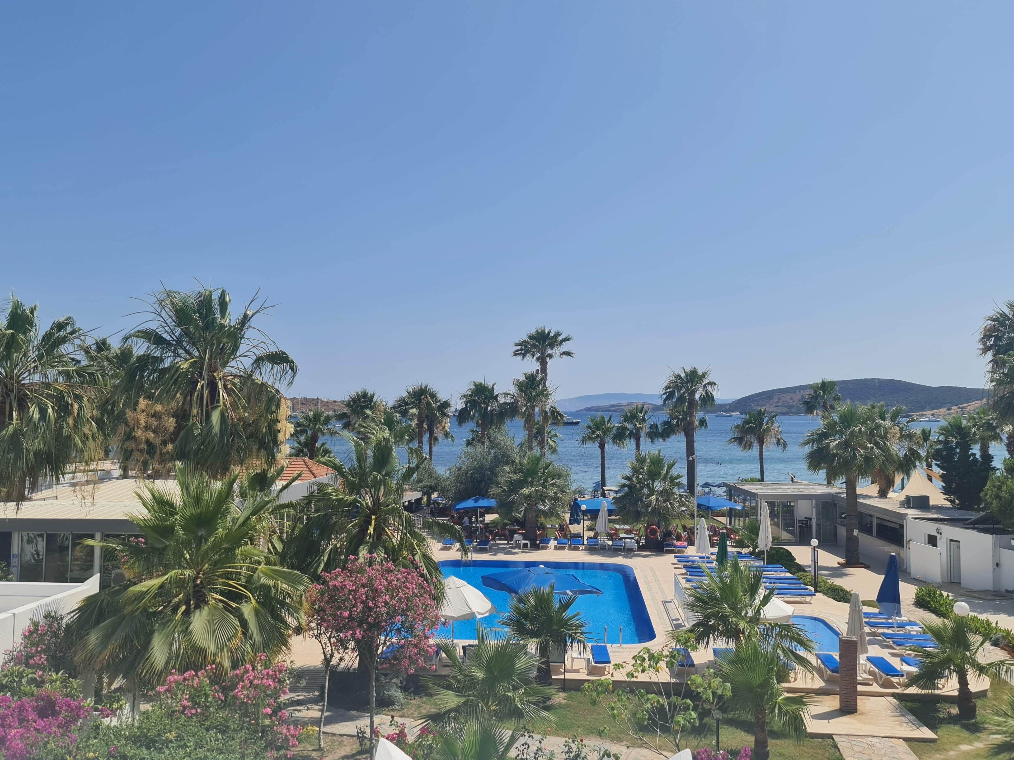 2 outdoor pools, open 9:00 AM to 6:00 PM, pool umbrellas, pool loungers