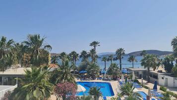 2 outdoor pools, open 9:00 AM to 6:00 PM, pool umbrellas, pool loungers
