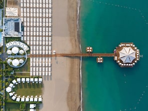 Private beach, sun-loungers, beach umbrellas, beach bar - Sueno Hotels Deluxe Belek - All Inclusive (Serik)