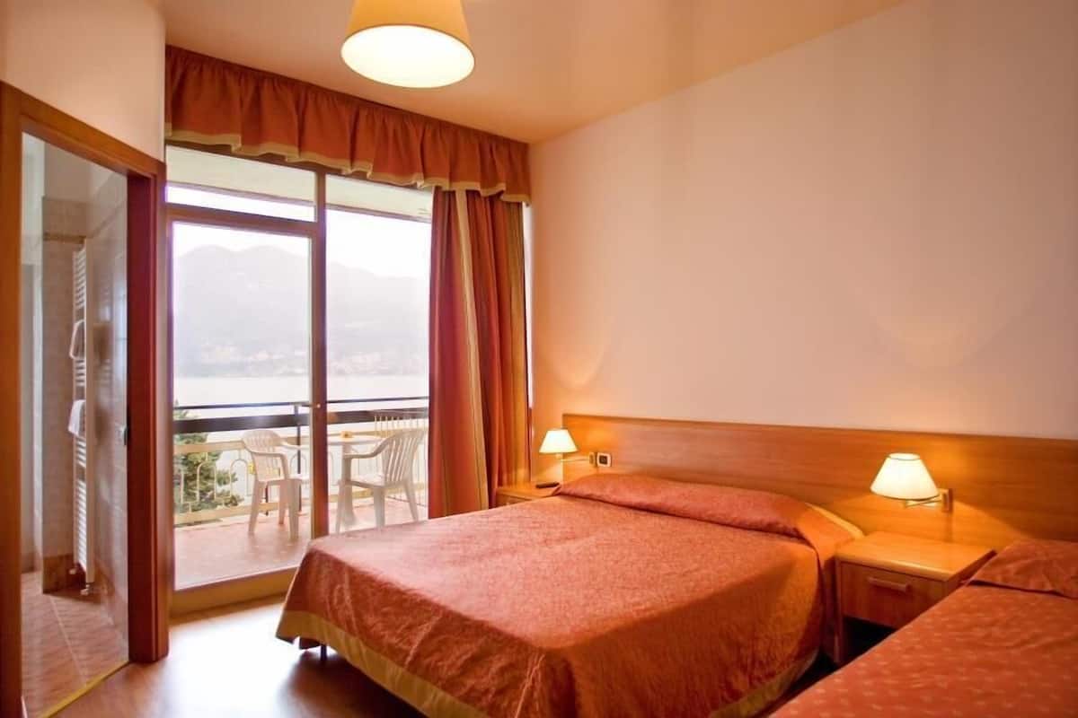 Doppia Classic, balcone, lato lago | 1 camera, una cassaforte in camera, una scrivania, Wi-Fi gratuito