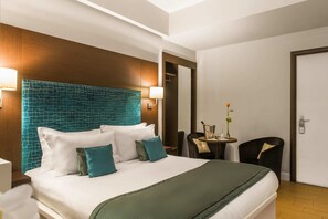 Dundyner, minibar, safe på rommet og skrivebord