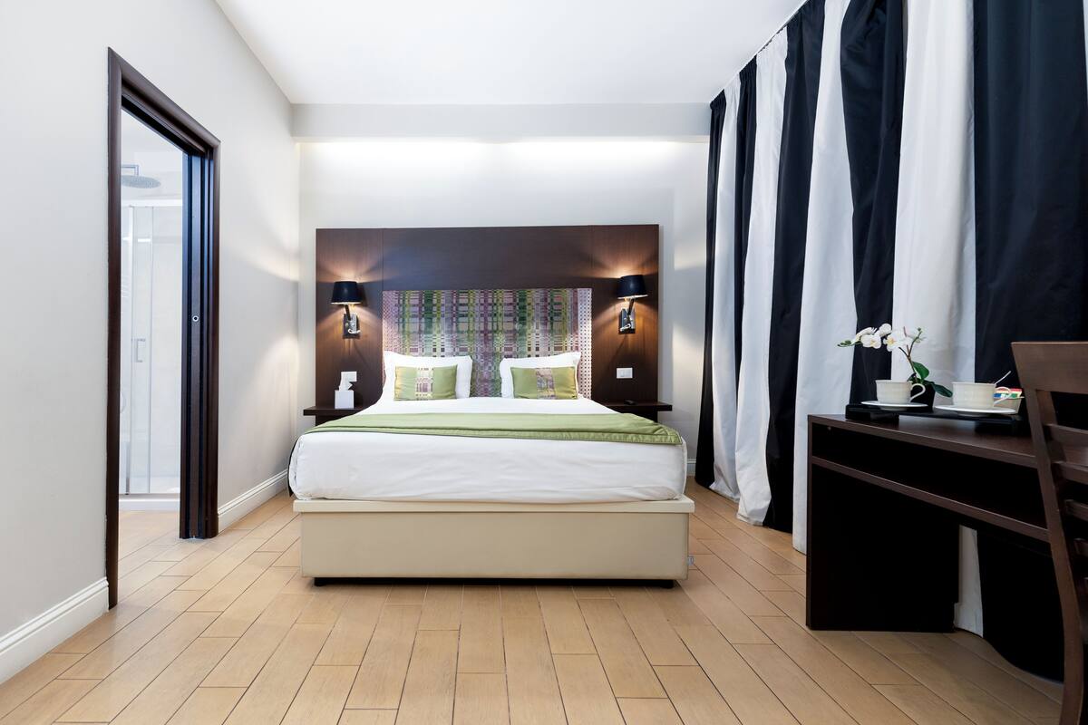 Family Room | Down comforters, minibar, in-room safe, desk