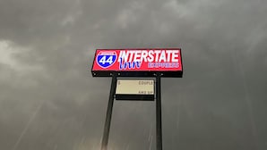A sign for Interstate 44 and Interstate 80, indicating a junction or connection point. - Interstate Inn Express (Tulsa)