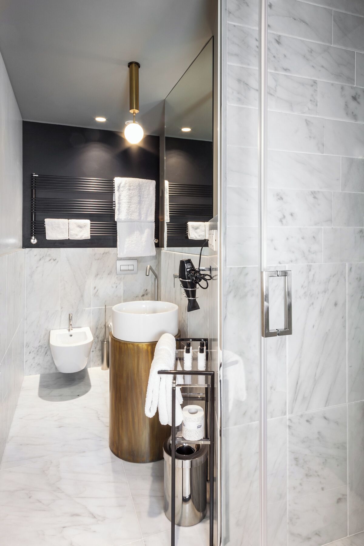 rainfall showerhead, hair dryer, slippers, bidet