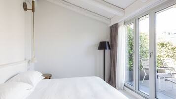 Junior Suite, Terrace, Courtyard View | Premium bedding, down comforters, minibar, in-room safe