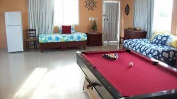 Three Bedroom Penthouse | Living area | 32-inch TV with cable channels, video-game console, DVD player