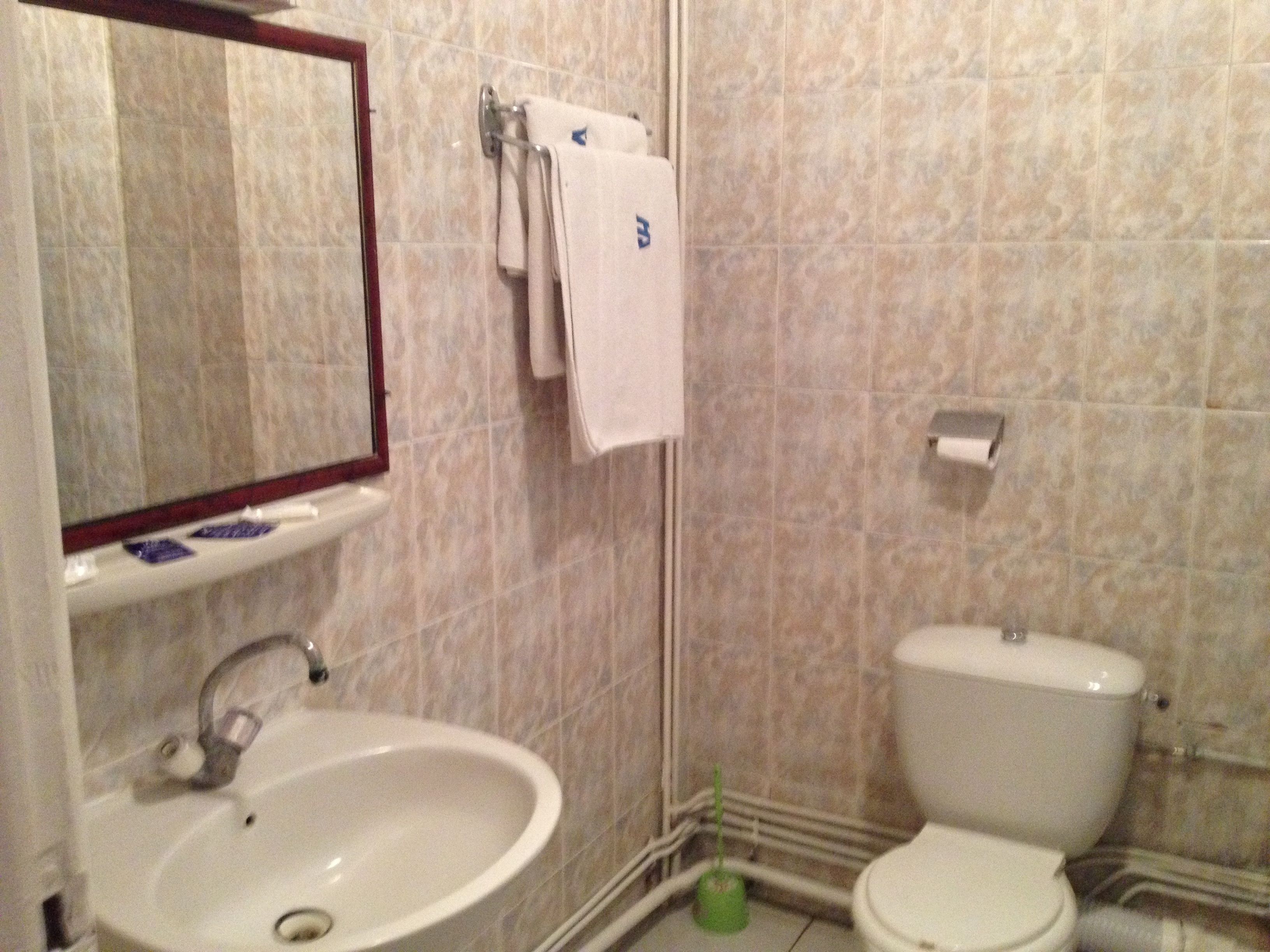 bathtub, hair dryer, towels