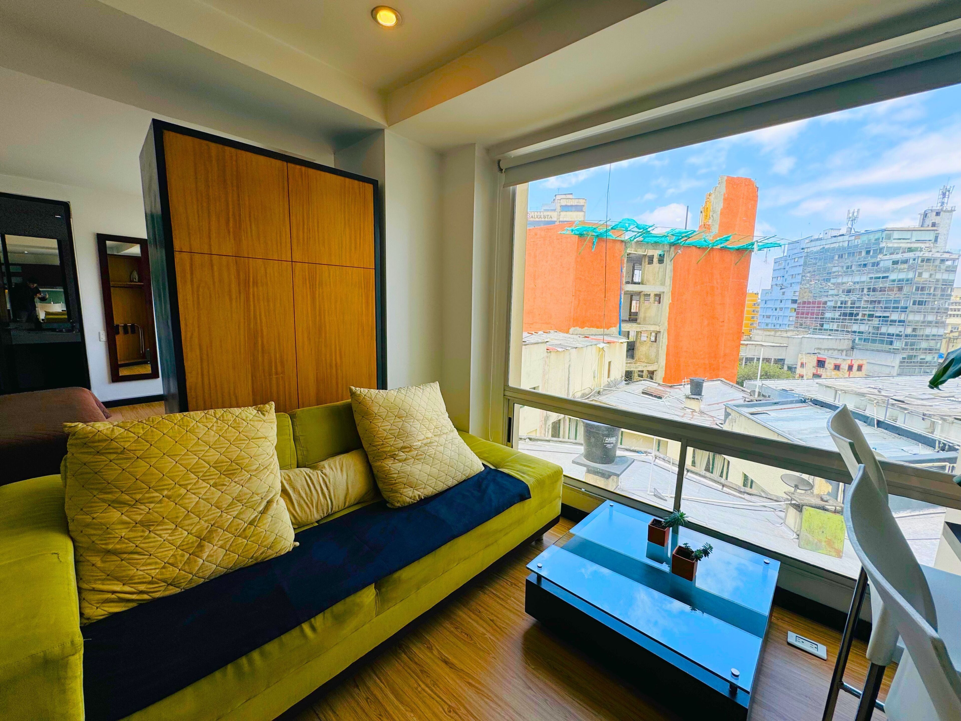 Deluxe Apartment, 1 Bedroom | Living area | 32-inch flat-screen TV with satellite channels, TV