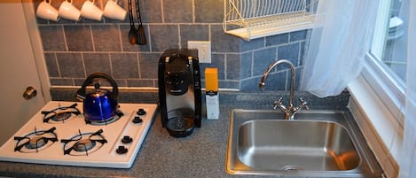 Business Studio | Private kitchenette | Full-size fridge, microwave, stovetop, coffee/tea maker
