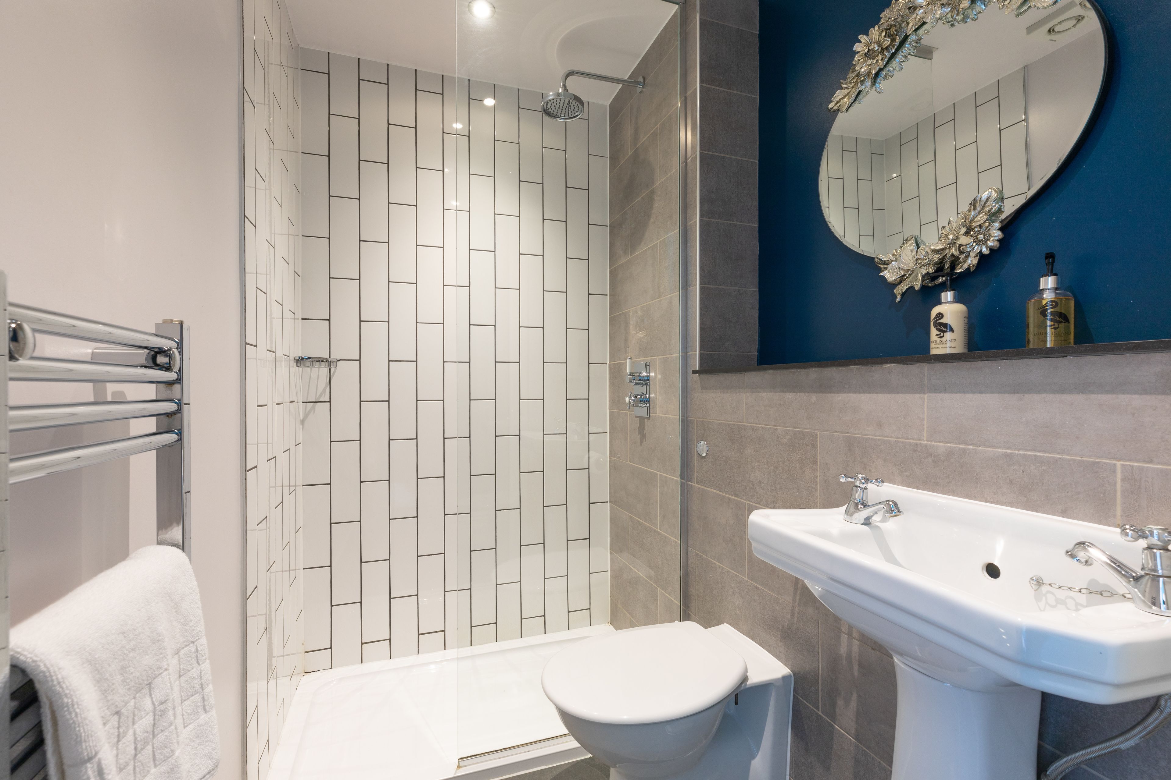 classic twin room | bathroom | shower, free toiletries, hair dryer, towels