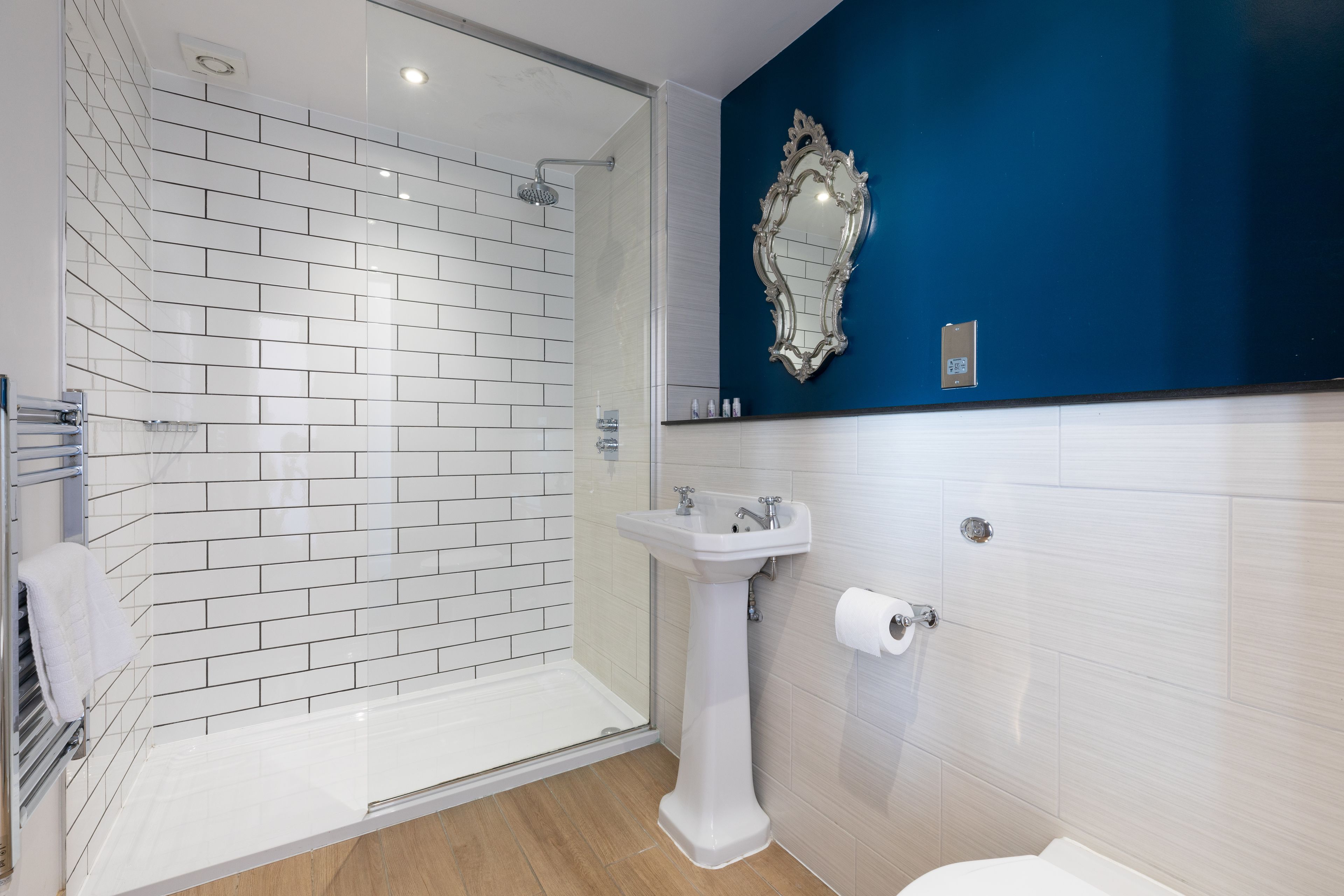 superior double room | bathroom | shower, free toiletries, hair dryer, towels